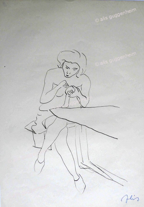 Frau am Tisch sitzend