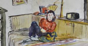 Mädchen auf Bett sitzend