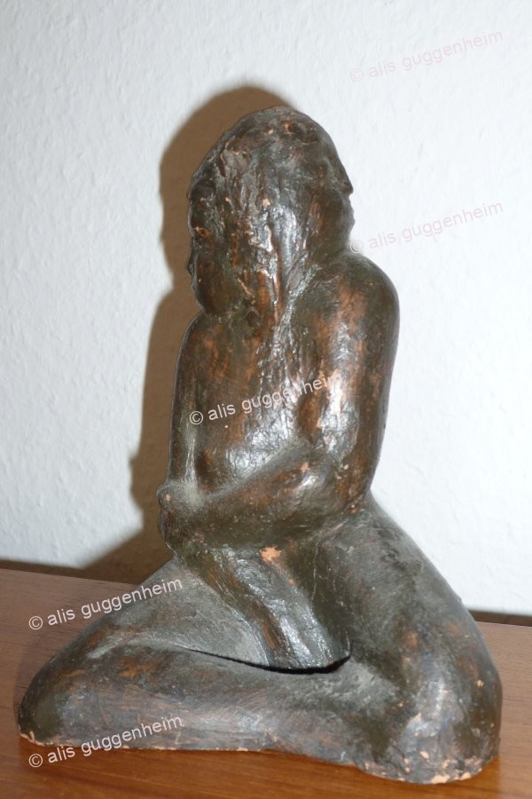 Figur mit zwei Gesichtern