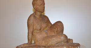 Sitzende Frau